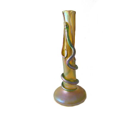 A Loetz iridescent glass vase, early 20th century of stylized tree trunk form with three openings, entwined with a trailing s