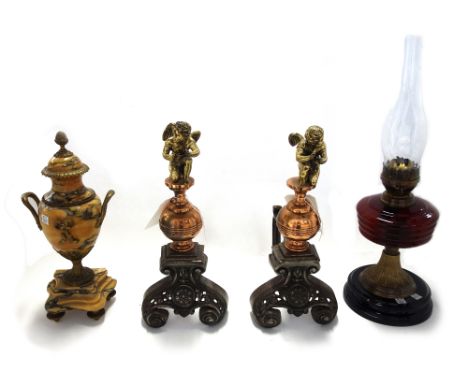 A pair of copper and steel andirons, 19th century, with brass angel finials (41cm high), a marble and ormolu mounted urn garn