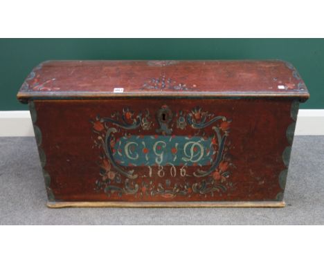 A 19th century Tyrolean polychrome painted pine dome top trunk, 97cm wide x 51cm high.