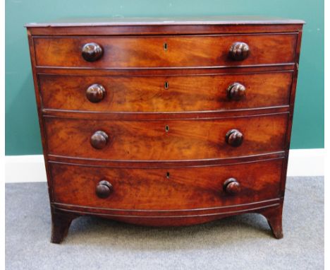 A Victorian mahogany bowfront chest of four long graduated drawers on splayed bracket feet, 91cm wide x 82cm high.