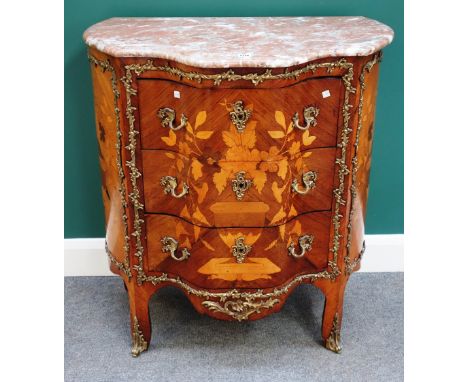 An 18th century style marble topped gilt metal mounted marquetry inlaid kingwood serpentine three drawer commode, 86cm wide x