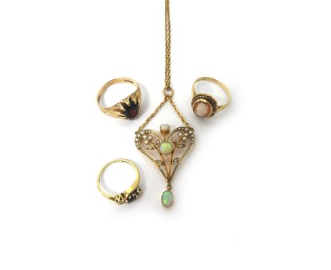 A gold, opal and seed pearl set pendant, with pierced decoration detailed 9 CT, with a neckchain, a 9ct gold ring, claw set w