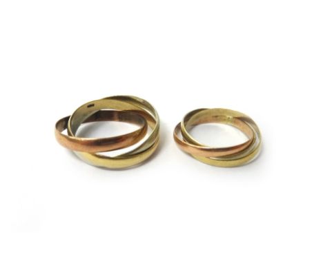 Two 9ct three colour gold triple band Russian style wedding rings, sizes Q and K and a half, combined weight 6 gms, (2).