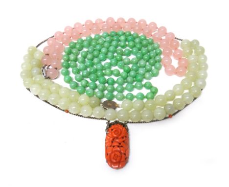 A single row necklace of jade beads, a single row necklace of rose quartz beads, on a snap clasp, a single row necklace of pa