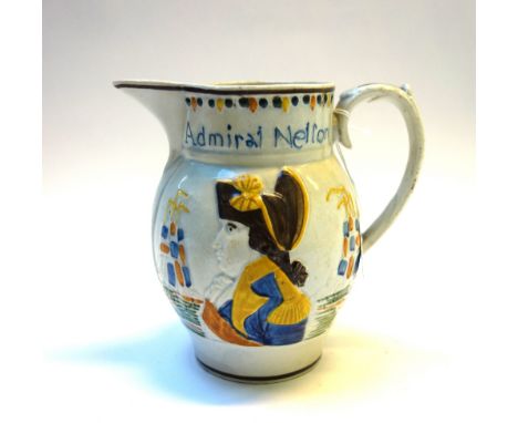 A Pratt ware jug, circa 1805, one side moulded with a titled head and shoulders portrait of Admiral Nelson, the reverse with 