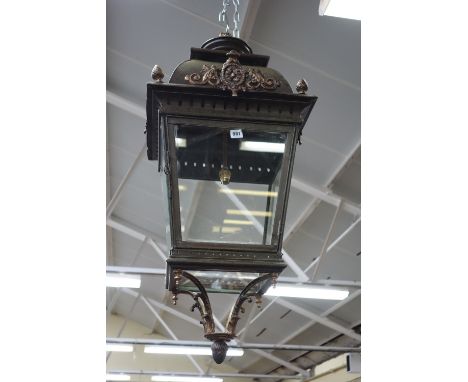 A gilt and patinated metal lantern, late 20th century, of tapering square form, with gilt foliate surmounts and embellishment