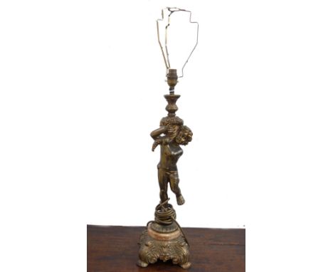 A gilt metal figural table lamp, modelled with a cherub figure holding a cornucopia (53cm high) and two further modern table 