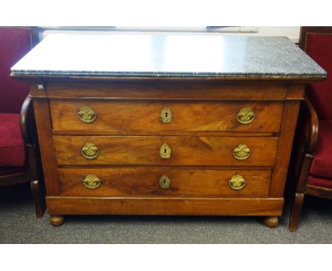 An early 19th century French fruitwood commode, with marble top over four long drawers, 129cm wide x 88cm high.