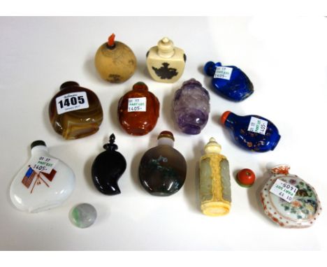 A group of twelve Chinese snuff bottles, 19th/20th century, various materials, including; two porcelain bottles; an amethyst 