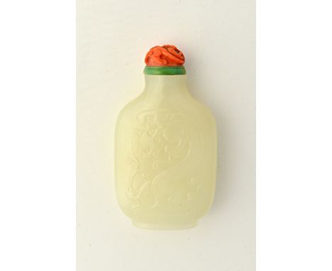 A Chinese white jade snuff bottle, 20th century, of flattened rounded rectangular form, each side carved in row relief with a