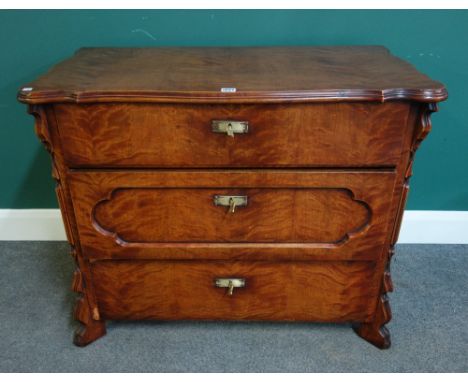 An 18th century Continental style stained birch commode with shaped top over three drawers, 95cm wide x 80cm high