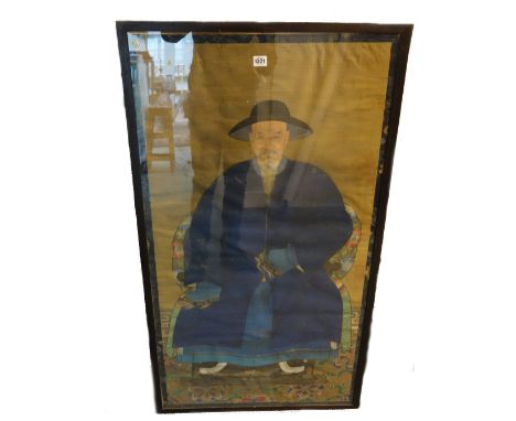 A Chinese ancestor portrait, 19th century, opaque pigment on silk, painted with a seated elderly gentleman wearing blue robes