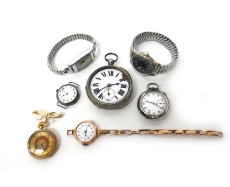 A lady's gold cased, keyless wind, openfaced fob watch, with a gilt jewelled lever movement, gold inner case, the decorated g