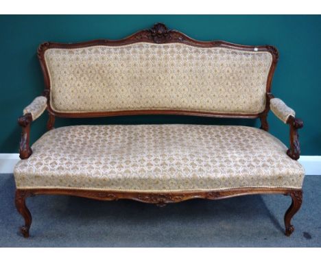 A Louis XV style carved walnut salon suite, the sofa 149cm wide x 110cm high, the fauteuils 65cm wide x 98cm high (3).  47