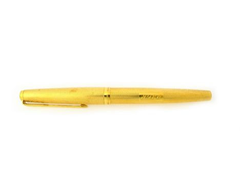 An 18ct gold Parker fountain pen, with engine turned decoration, monogram engraved, London 1973, gross weight including mecha