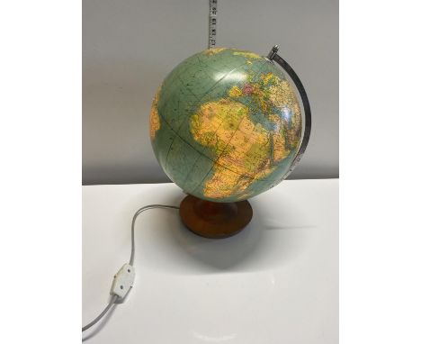 A vintage world globe lamp in working order, shipping unavailable