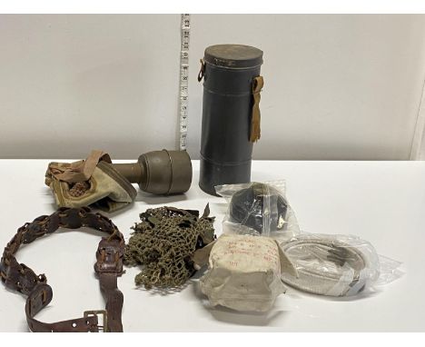 A selection of vintage military items including gas mask etc