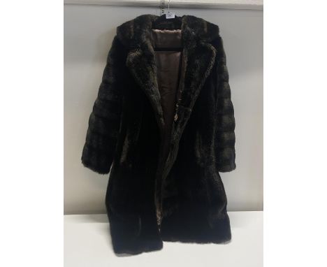 A vintage ladies fur coat