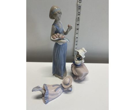 Two Nao and one Leonardo figurine, tallest 33cm, shipping unavailable