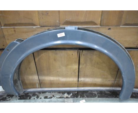 A Jaguar or Daimler rear wheel spats