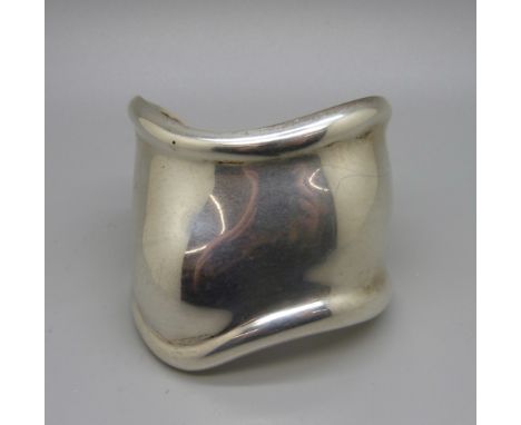 A silver Tiffany &amp; Co. 'bone' cuff bangle by Elsa Peretti, 83.7g, opening 32mm 