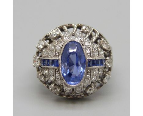 An Art Deco sapphire and diamond ring, tests as platinum, 9.9g, N 