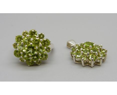 A silver and peridot cluster ring and a matching pendant, ring size P 