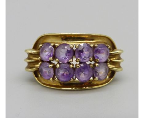 A 14ct gold ring and amethyst ring, marked 585, 5.7g, O 