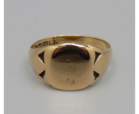 A 9ct gold signet ring, 5.8g, V 