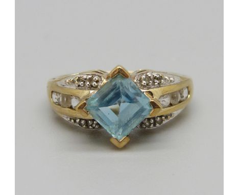 A 9ct gold, aquamarine, diamond and white sapphire ring, 3.9g, N 