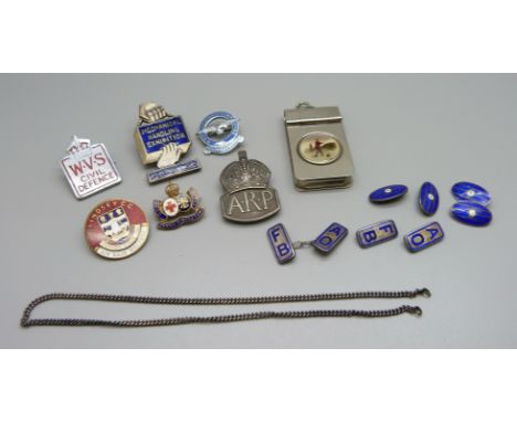 A silver ARP badge, five other badges, two pairs of silver and enamel cufflinks, a/f, and a vesta case with golf scene 