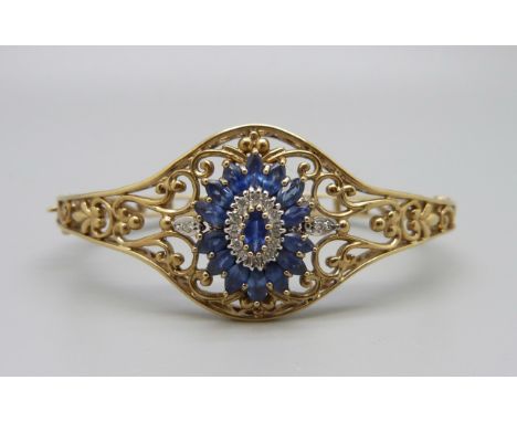 A 9ct gold, sapphire and diamond bangle, 15.5g 
