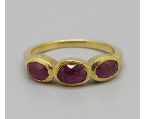 A silver gilt, three stone rose cut ruby ring, 1.5ct, with certificate, N 