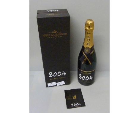 A bottle of Moet and Chandon 2004 Grand Vintage champagne, boxed 