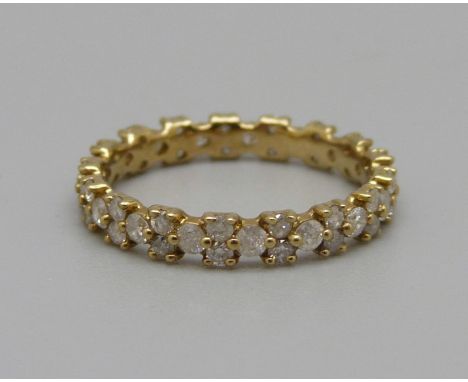 A 9ct gold and diamond full eternity ring, 1.1g, I 