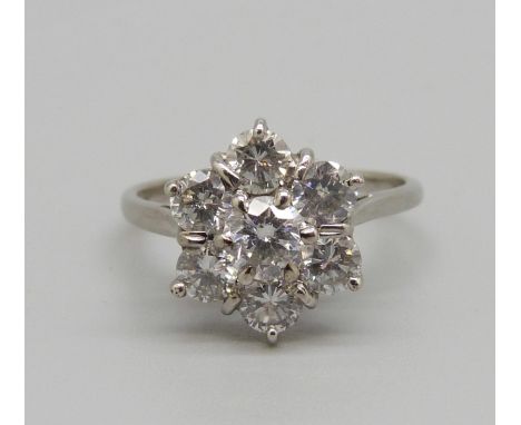 An 18ct white gold and diamond cluster ring, 3.8g, P 