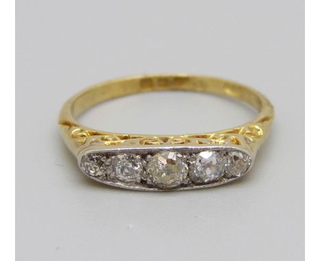 A 18ct gold, five stone diamond ring, London 1916, 2.2g, L, approximately 0.3ct diamond weight 