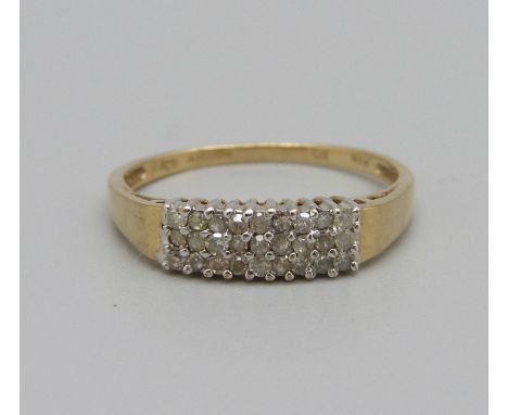 A 9ct gold, twenty-seven diamond ring, 0.29carat diamond weight marked on the shank, 1.9g, P 