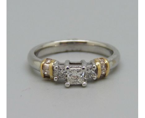 An 18ct gold Princess cut diamond ring with diamond shoulders, approximately 0.4carat total diamond weight, 4.2g, J 