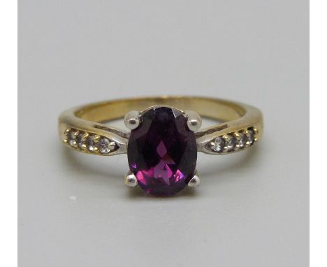 A silver gilt, rhodolite garnet and zircon ring, L 