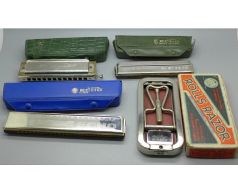 Three harmonicas comprising Hohner 2509, 2309 and Chromonica and a Rolls razor 