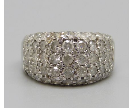 A 9ct white gold and diamond ring, 8g, Q, lacking some stones