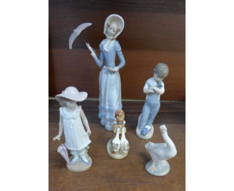 A collection of Lladro and Nao figures, large one a/f and a Goebel figure 