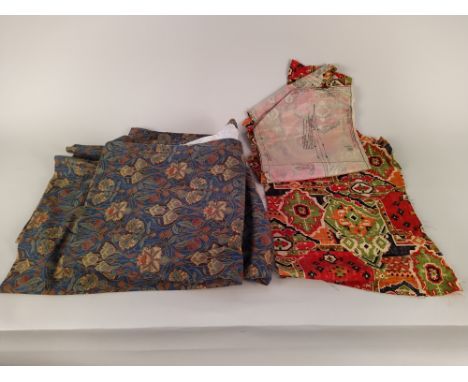 A box of assorted vintage curtains and dressmaking fabric