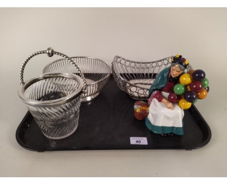 Two plated fruit baskets plus a cut glass, a silver plated ice pail plus a Royal Doulton figurine 'Old Balloon Seller'