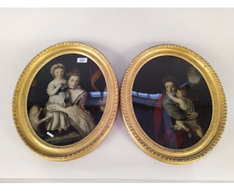 A pair of early 19th Century portrait prints of mothers with children in original oval gilt frames