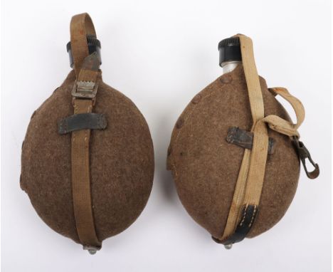 WW2 German Army Water Bottles / Canteens: Original wartime water bottles with felt cloth covers, webbing straps with metal cl