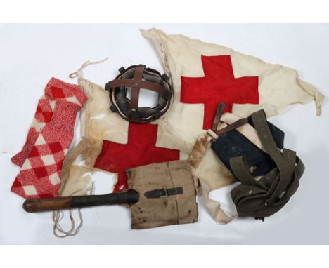 Military Equipment: Entrenching tool with cover, helmet liner, braces, housewife kit, belts and Red Cross flags. Quantity 