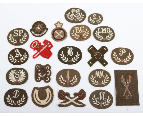 Grouping of British Army Trade badges. Examples in this lot include ,  Guards Trained Soldier, Sniper, Artificer, Lewis Gunne