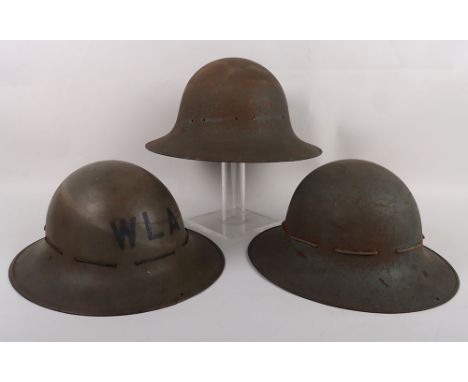 WW2 British Home Front Zuckerman Helmets: Civil helmets one with WLA to front complete liner and named inside EDNA HILL FARM,